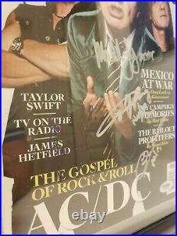 Autographed ACDC Rolling Stone Magazine. 4/PSA