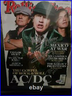 Autographed ACDC Rolling Stone Magazine. 4/PSA